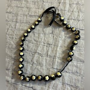 KUKUI NUT LEI HIBISUS FLOWER HAWAIIAN WEDDING NECKLACE ON BLACK RIBBON